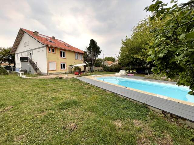Maison familiale avec piscine et revenus locatifs ? Paimboeuf (44560) — photo du bien