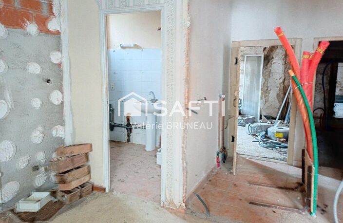 BATISSE A RENOVER DE 460 M2 AU CENTRE VILLAGE — photo 5