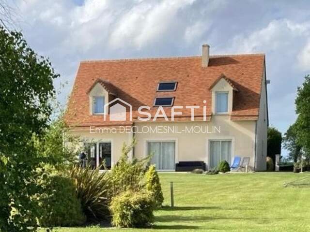 Superbe propriété, triple garage — photo du bien