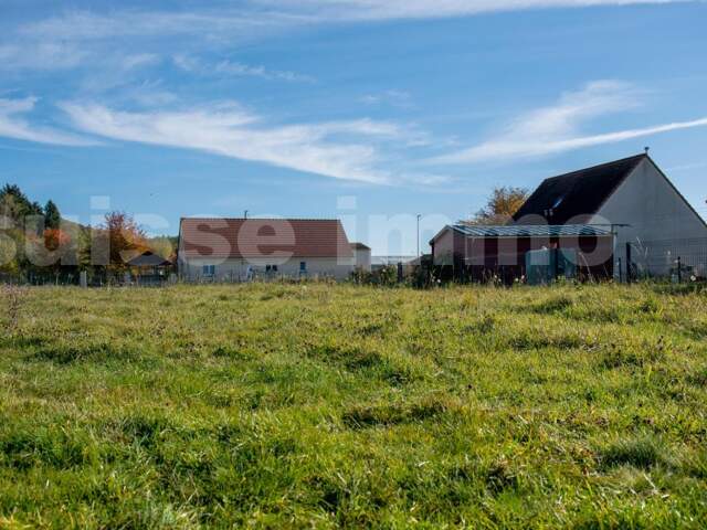 Terrain plat de 11 ares — photo du bien