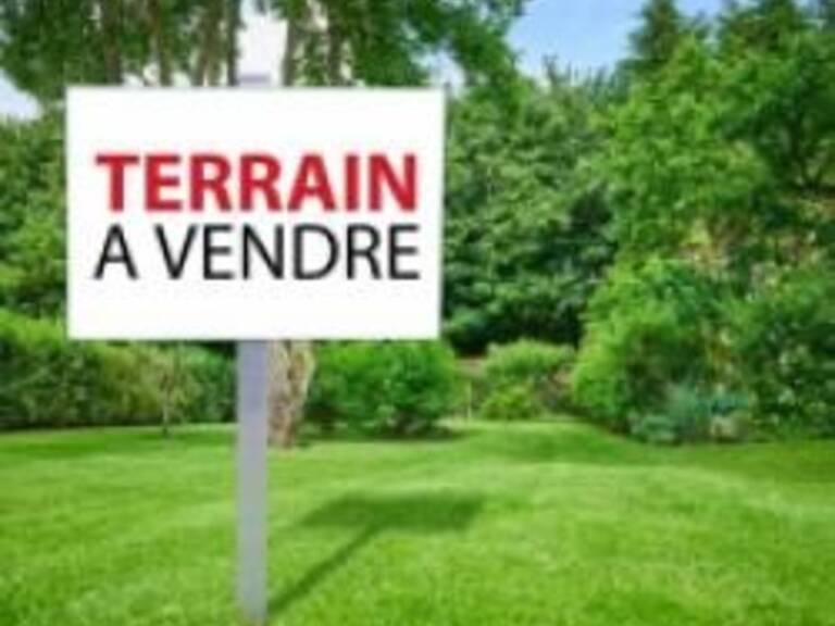 GUISSENY TERRAIN HORS LOTISSEMENT VIABILISE DE 867M² — photo 1
