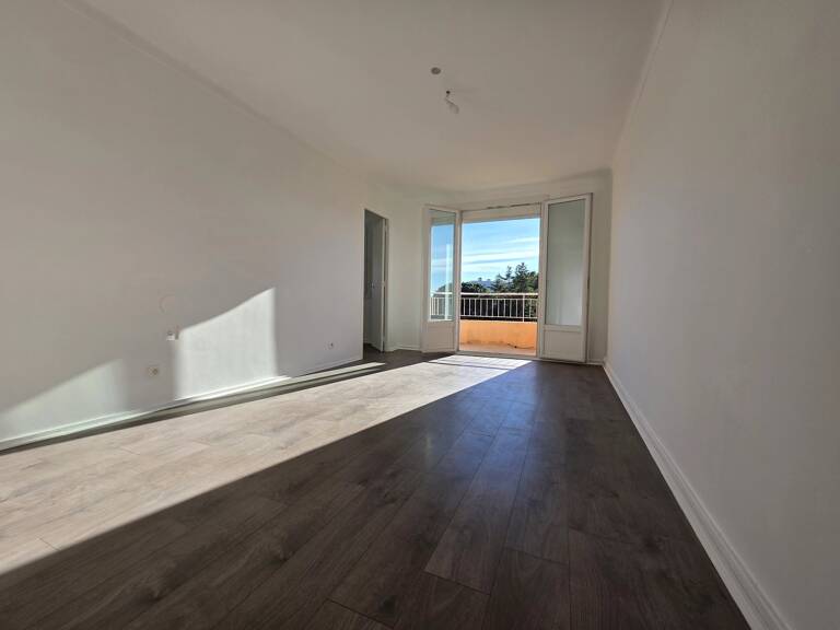 Appartement 55 m² – 2 chambres – balcon – cave – parking — photo 1