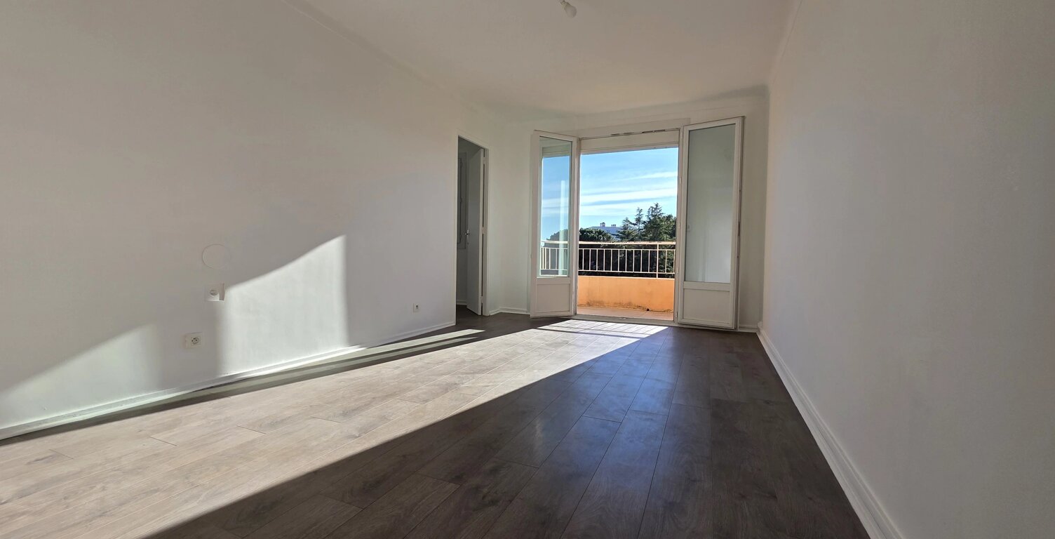 Appartement 55 m² – 2 chambres – balcon – cave – parking — photo 1