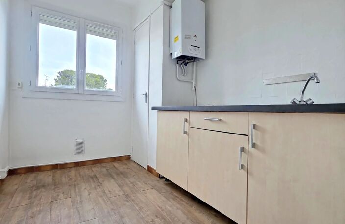 Appartement 55 m² – 2 chambres – balcon – cave – parking — photo 2