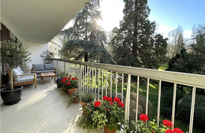 Appartement familial traversant, terrasse de 22 m², 4 chambres, double box et vue sur parc — photo 2