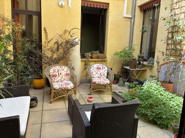 Nimes , P4 de 137 m2 avec patio lumineux en coeur de ville — photo du bien