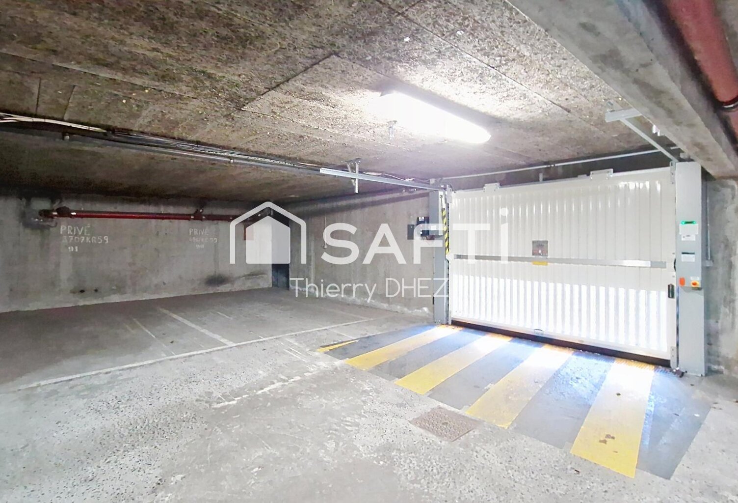PROCHE CHR - PLACE DE PARKING EN SOUS-SOL 13m² - RÉSIDENCE SÉCURISÉE - POSSIBILITE ACHAT 2è PLACE — photo 1