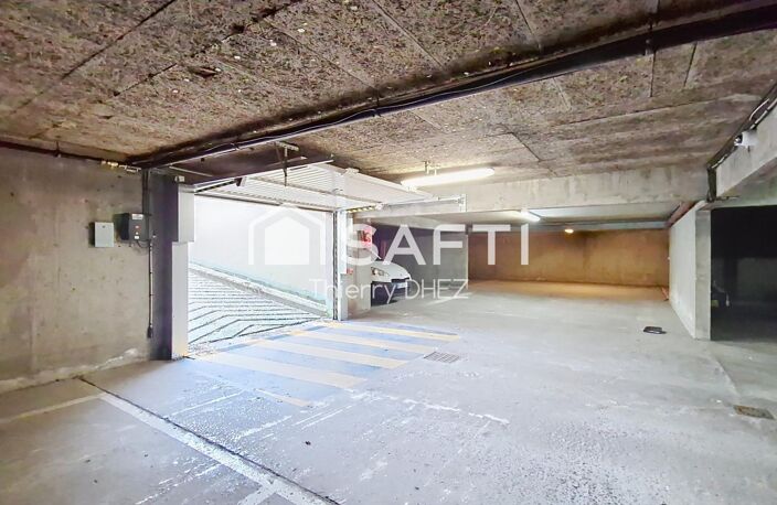 PROCHE CHR - PLACE DE PARKING EN SOUS-SOL 13m² - RÉSIDENCE SÉCURISÉE - POSSIBILITE ACHAT 2è PLACE — photo 2