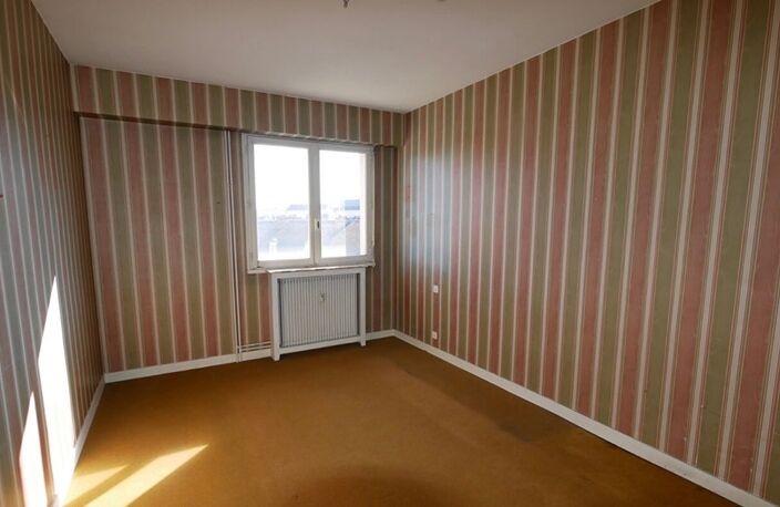 Appartement T5 de 100 m² avec balcon, ascenseur, cave et stationnement – Fort potentiel à Limoges — photo 5