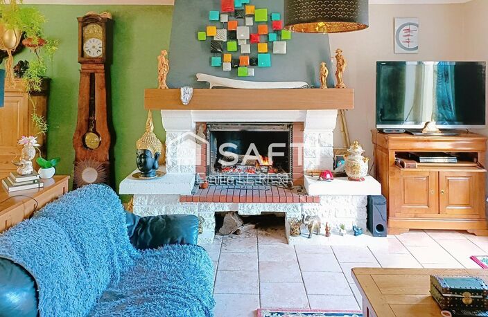 Une maison familiale au cœur d'un écrin de verdure — photo 3