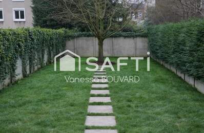 Maison mitoyenne rénovée avec jardin et sous-sol aménagé — photo du bien