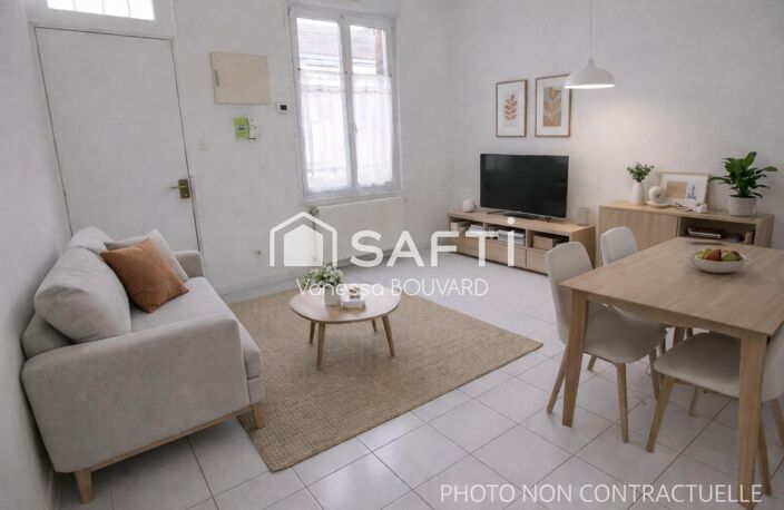 Maison mitoyenne rénovée avec jardin et sous-sol aménagé — photo 3