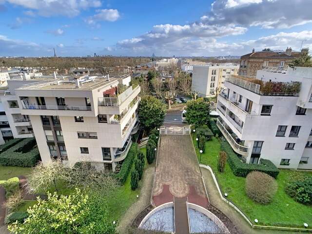 6ème et dernier étage - Appartement de 116 m² + 2 terrasses de 18 m² chacune + 1 cave + 2 parkings boxés côte à côte — photo du bien
