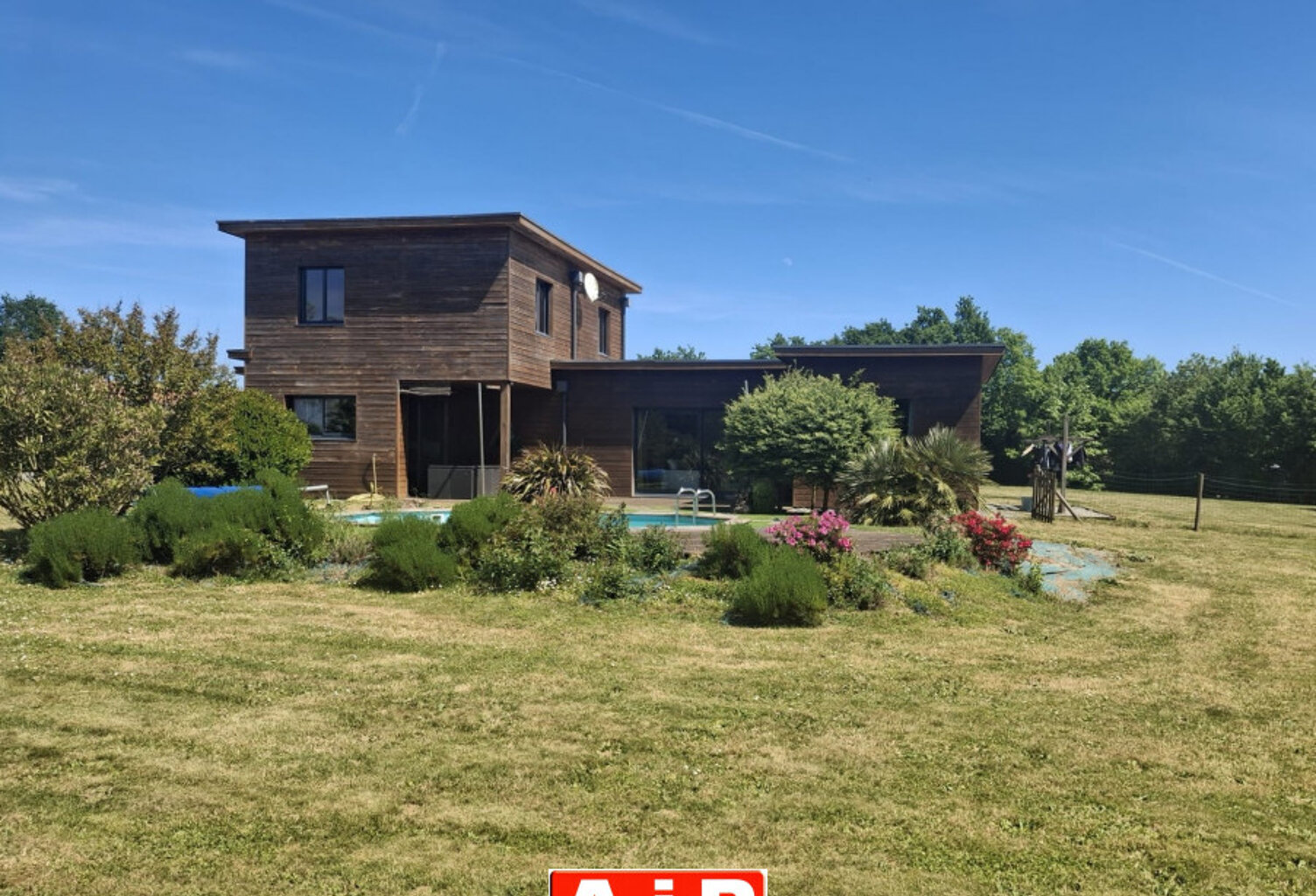 MAISON OSSATURE BOIS STYLE ARCHITECTE AVEC PISCINE — photo 1