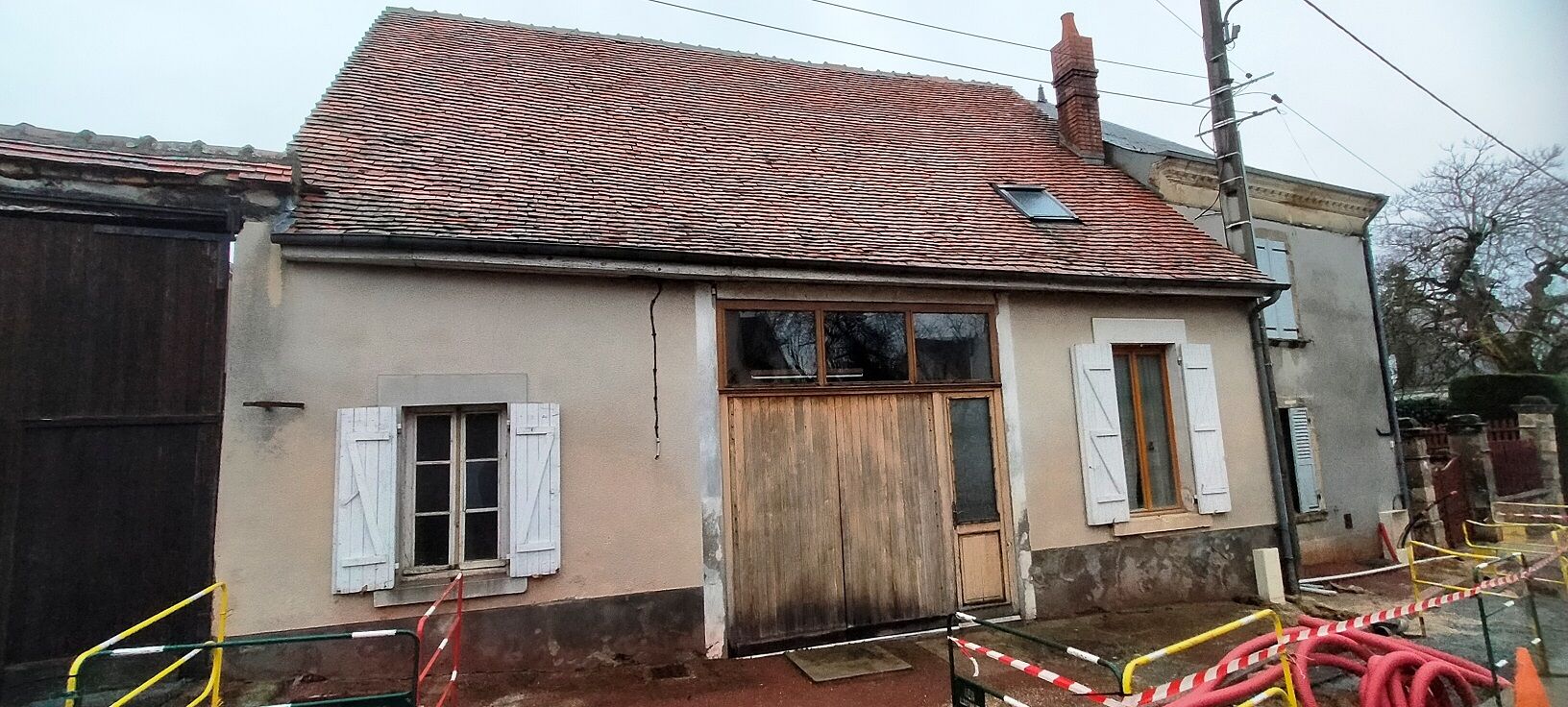 Maison à rénover de 70 m2 avec garage et jardin clos