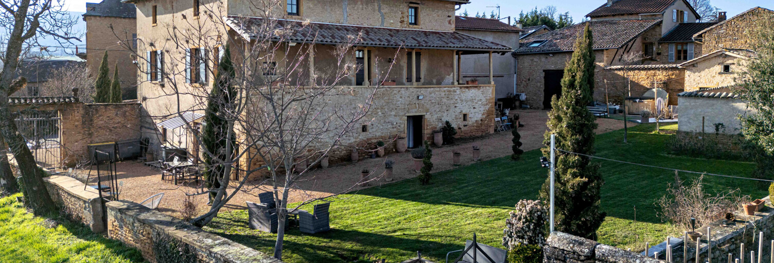 Maison 12 Pièces 430 m² à vendre à Porte des Pierres Dorées (69400)