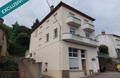 Immeuble comprenant 4 appartements et un garage. — photo du bien
