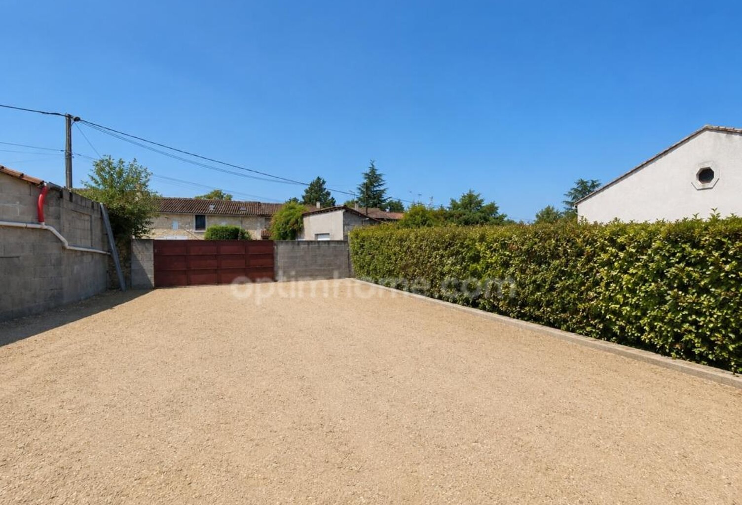 MARTHON Terrain CU de 911 m² clos, avec deux garages fermés — photo 1