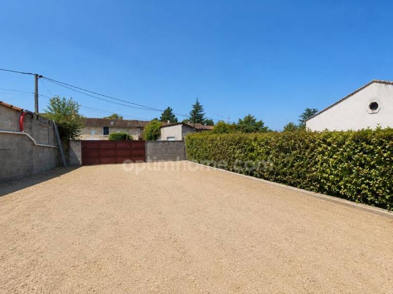 MARTHON Terrain CU de 911 m² clos, avec deux garages fermés — photo 1