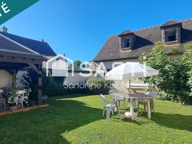 Spacieuse maison familiale 7 pièces, avec garages et jardin. — photo du bien