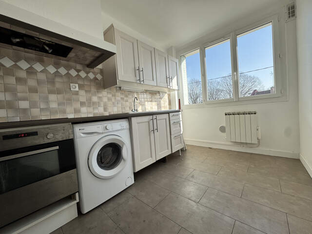 Appartement de type 2 avec cave et parking en plein centre — photo du bien