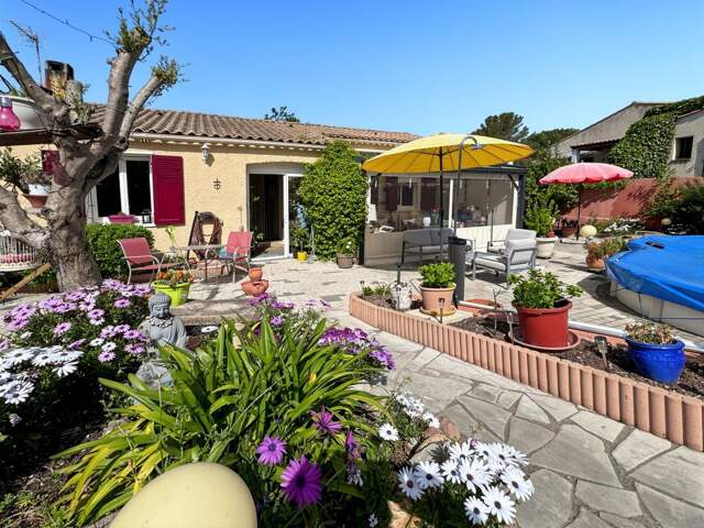 Maison individuelle de plain pied de 4 pièces 77.37 m2 habitable + pergola + garage — photo du bien