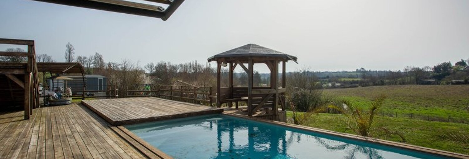 Maison 8 Pièces 199 m² à vendre à Saint-Genès-de-Lombaud (33670)