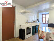 DANS UN JOLIE BOURG, IMMEUBLE LOUÉ AVEC LOCAL COMMERCIAL EN — photo 4
