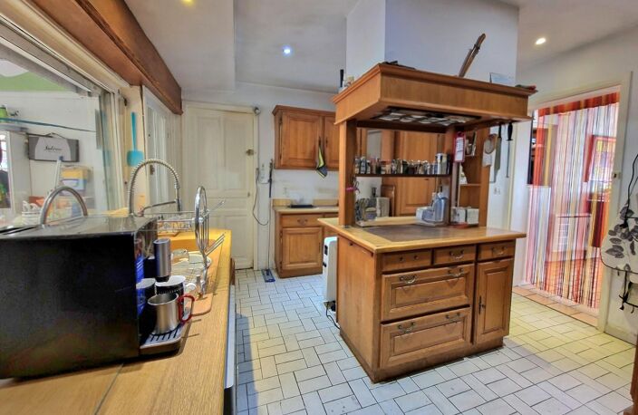 Habitation avec grand garage et fort potentiel — photo 4