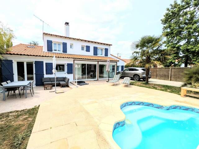 Maison 160 m²  4/5 chambres  Piscine  Garage 56 m²  Terrain 980 m²  La Chevrolière — photo du bien