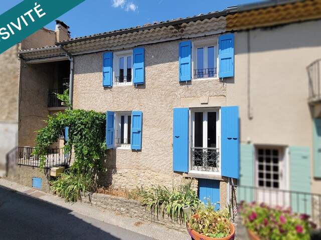 Maison de village avec grand garage et terrasses — photo du bien