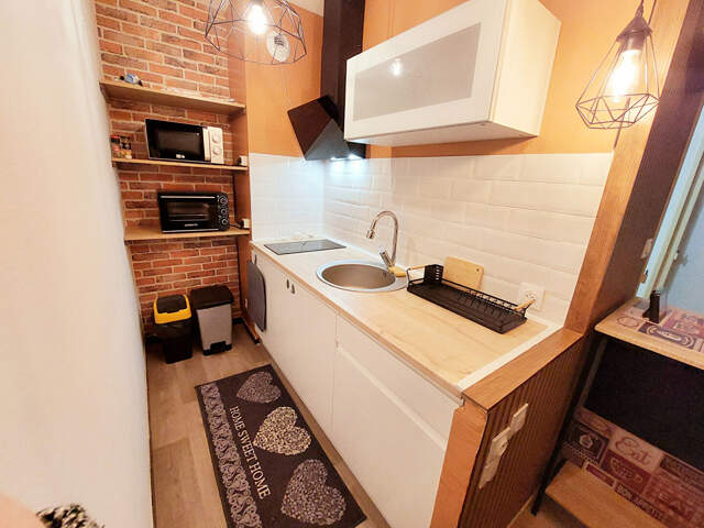 DISPONIBLE - Appartement T2 avec parking privatif et  grande cave privative — photo du bien
