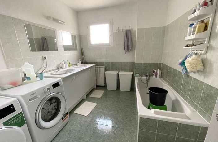 Maison 88 m² vendue avec locataire en place – 3 chambres, garage et jardin — photo 5