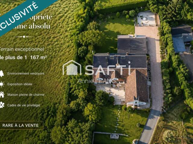 À seulement 7 minutes à pied du centre-ville de Montévrain, cette exceptionnelle maison de caractère de 244 m² est nichée au cœur d'un magnifique terrain paysager de 1 167 m². — photo du bien
