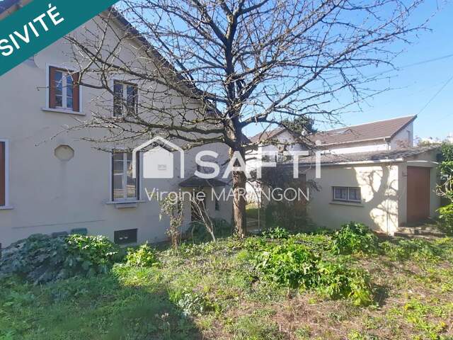 Maison familiale à rénover - Jardin arboré, 2 garages. — photo du bien
