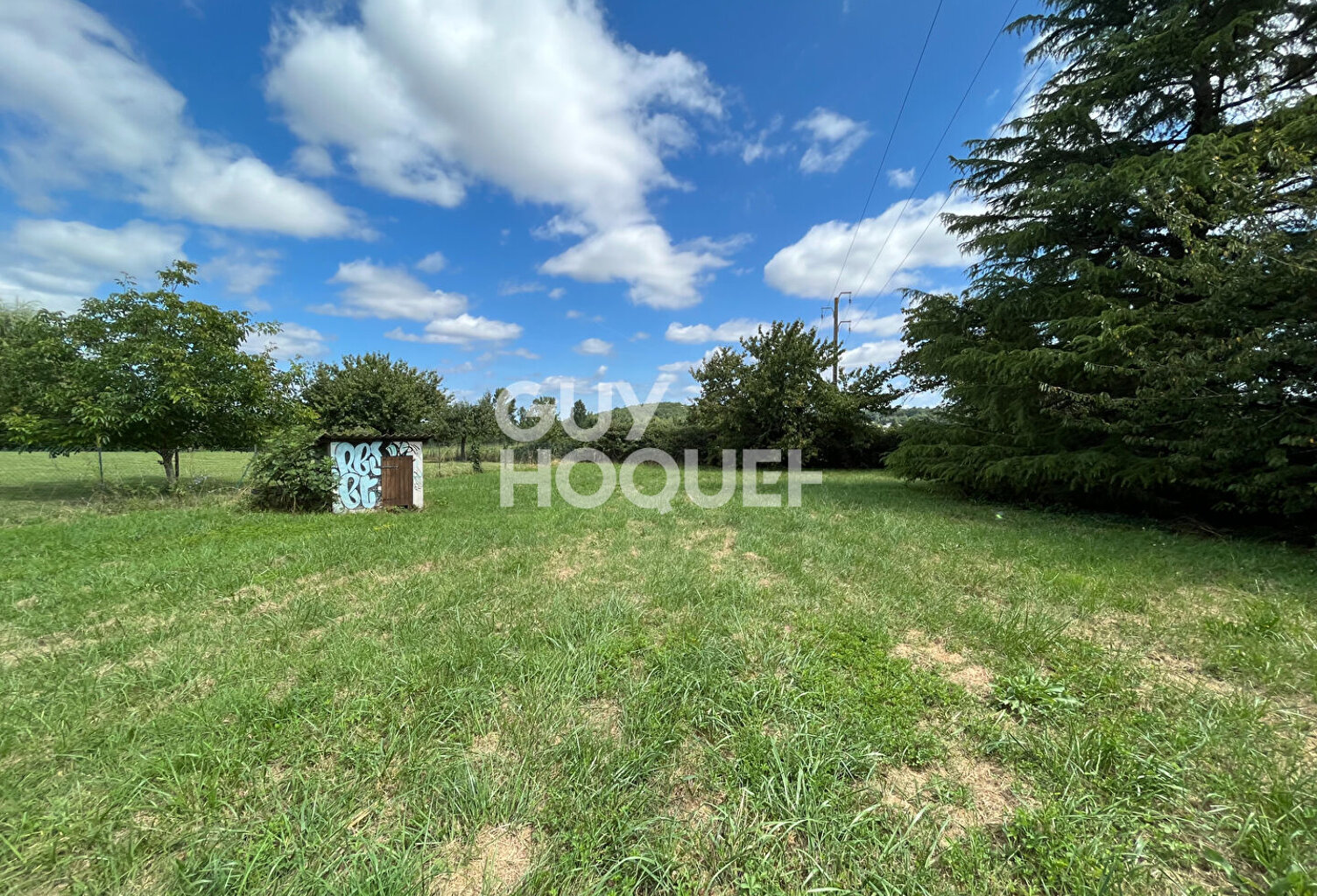 Terrain plat au coeur du village — photo 1