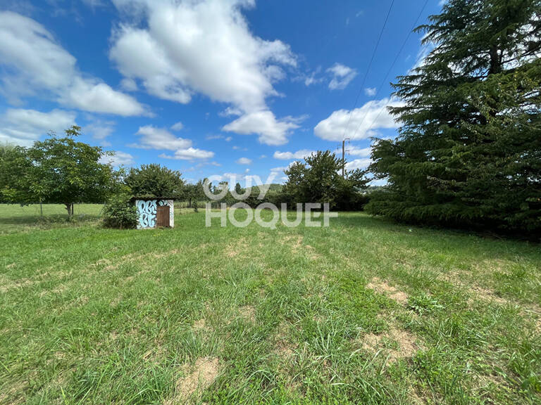 Terrain plat au coeur du village — photo 1