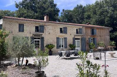 33720 - GUILLOS - 30mn de BORDEAUX - MAGNIFIQUE PROPRIETE AVEC MAISON EN PIERRE ET 1 HA DE PARC PAYSAGER — photo du bien