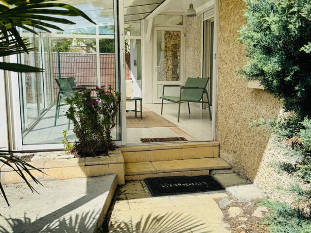 Maison de plain pied rénovée avec véranda et jardin - Quartier calme (07.56.88.28.68) — photo du bien