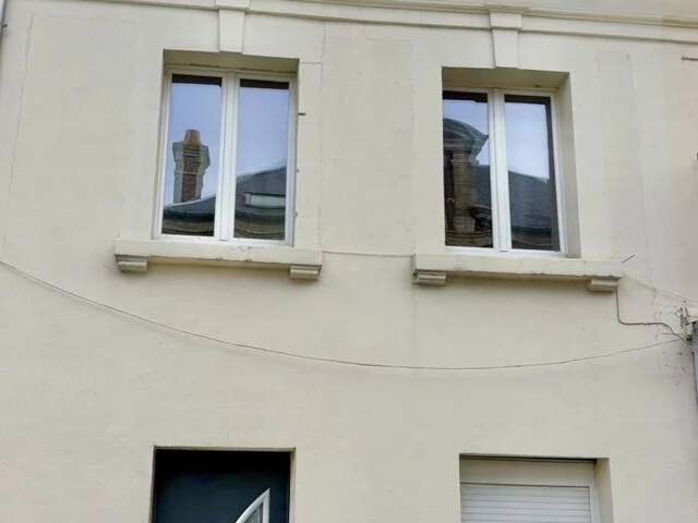 Maison jumelée en plein centre-ville –  124 000 euros — photo du bien