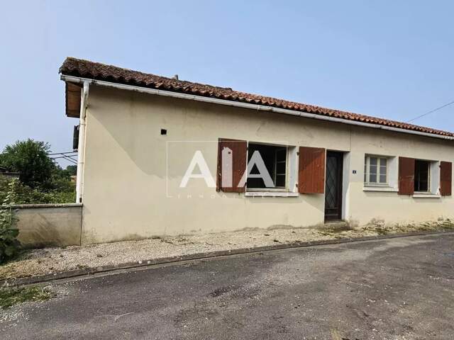 Maison de plain pied à Rénover — photo du bien