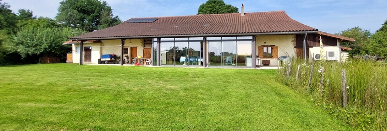 Maison 5 Pièces 163 m² à vendre à Saint-Trivier-de-Courtes (01560)