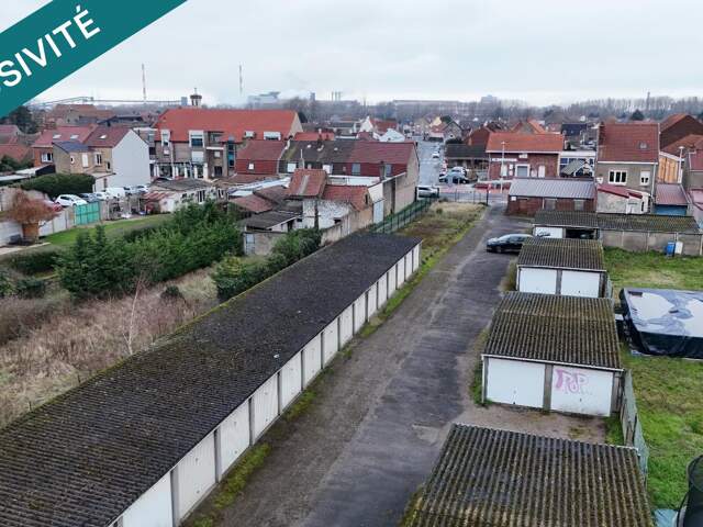 Fort-Mardyck  Garage fermé avec portail sécurisé. — photo du bien