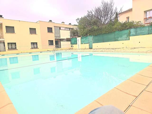 APPARTEMENT 70M2 EN T3 À Cavalaire-sur-Mer Charmant T3 entièrement rénové avec terrasse, piscine et parking — photo du bien