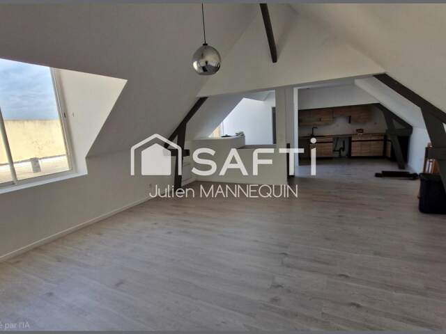 maison mitoyenne de 100 m2 , 2 chambres dont une suite parentale avec sa douche, cuisine ouverte sur le salon et accès a une terrasse — photo du bien