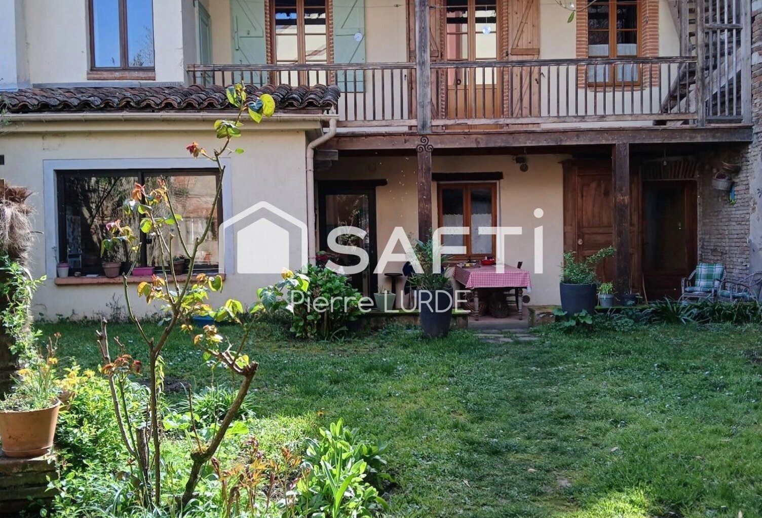 Toulousaine rénovée de 180 m2 avec jardin et garage — photo 1