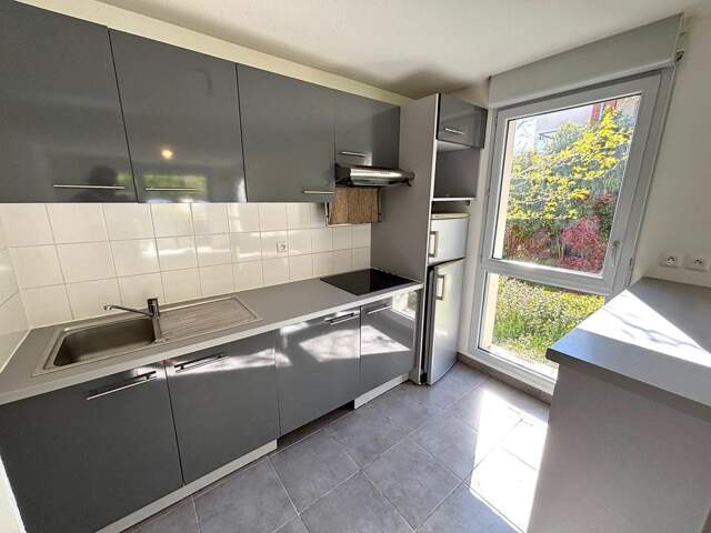 Appartement T3 de 62,78 m2 avec terrasse et parking — photo du bien