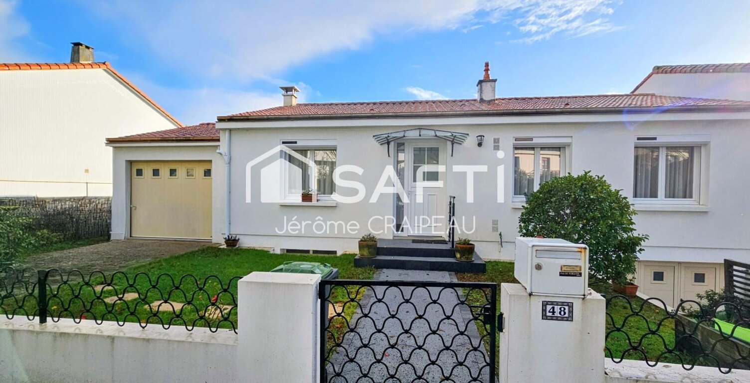 Proche écoles et services : Maison familiale avec 4 chambres et 2 garages. — photo 1
