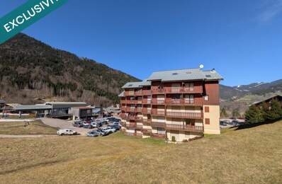 Studio cabine de 23m2 avec balcon exposé sud et casier à ski offrant une vue dégagée sur les alpages et montagnes environnantes. — photo du bien
