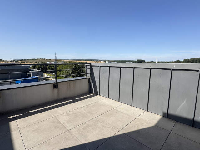 EN EXCLUSIVITÉ - APPARTEMENT TYPE 3 TERRASSE + STATIONNEMENT — photo du bien